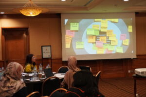 Public health professionals and community leaders discussing trusted voices in health communication as part of OUCRU IndonesiaÃ¢â‚¬â„¢s engagement project.